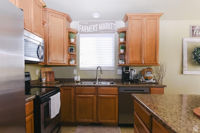615 W 850 N, Tooele, UT 84074 - kitchen featuring appliances with stainless steel finishes, open shelves, light tile patterned floors, and dark stone counters