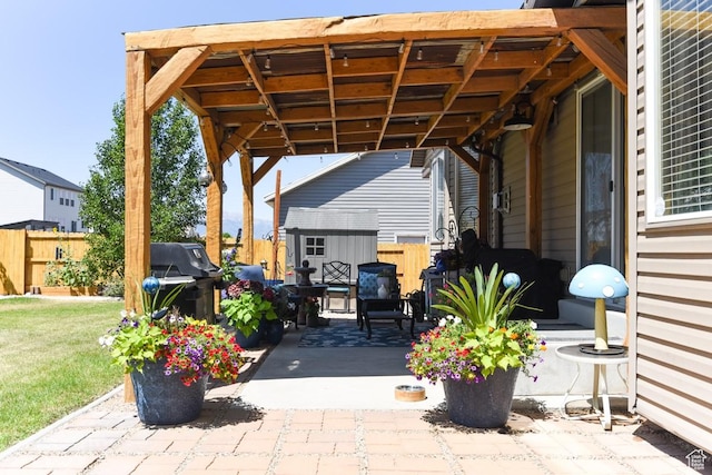 615 W 850 N, Tooele, UT 84074 - view of patio / terrace with a shed and grilling area
