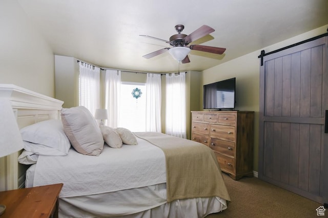 615 W 850 N, Tooele, UT 84074 - bedroom with carpet floors, a barn door, and a ceiling fan