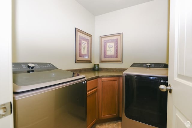 615 W 850 N, Tooele, UT 84074 - washroom with washer and dryer and cabinet space