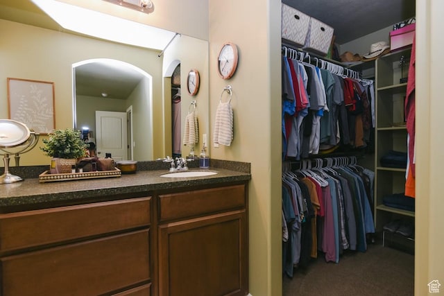 615 W 850 N, Tooele, UT 84074 - bathroom featuring vanity and a spacious closet