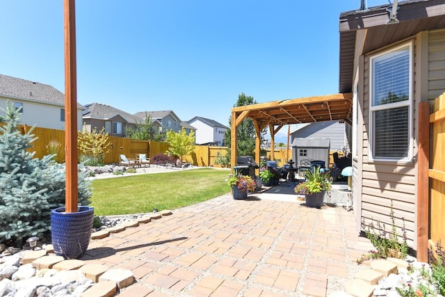 615 W 850 N, Tooele, UT 84074 - fenced backyard with a shed, a patio, and a residential view