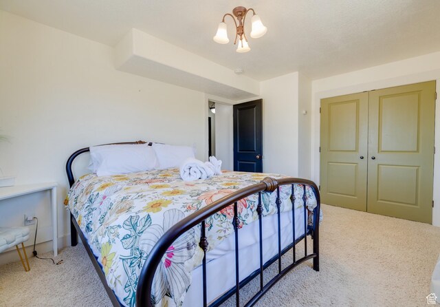 2599 S Foxridge Rd, Garden City, UT 84028 - bedroom with carpet floors and a closet