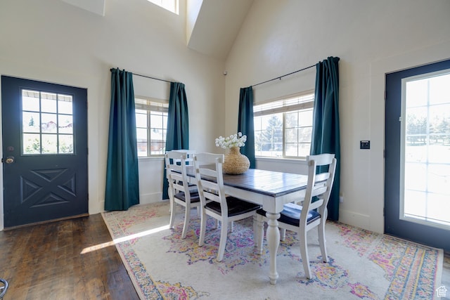 2599 S Foxridge Rd, Garden City, UT 84028 - dining area with plenty of natural light, hardwood / wood-style floors, and high vaulted ceiling
