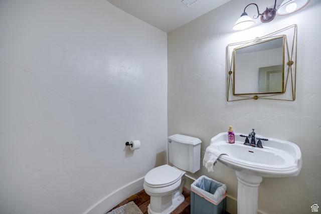 2599 S Foxridge Rd, Garden City, UT 84028 - bathroom with toilet and wood finished floors