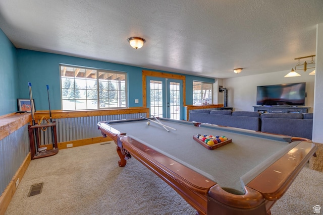 2599 S Foxridge Rd, Garden City, UT 84028 - playroom featuring a textured ceiling, billiards table, carpet floors, a wainscoted wall, and wood walls