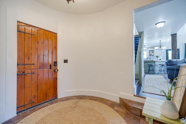2599 S Foxridge Rd, Garden City, UT 84028 - entrance foyer featuring stone tile floors