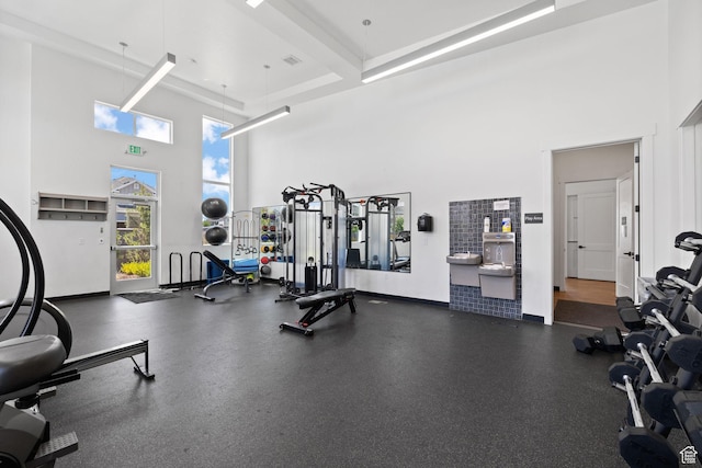 4892 E Lake Corner Dr, Eagle Mountain, UT 84005 - workout area with a towering ceiling