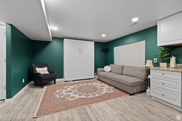 4892 E Lake Corner Dr, Eagle Mountain, UT 84005 - living area with light wood-type flooring and recessed lighting