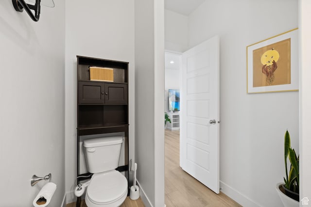 4892 E Lake Corner Dr, Eagle Mountain, UT 84005 - bathroom featuring wood finished floors and toilet