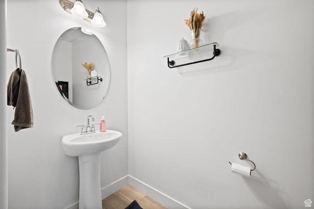4892 E Lake Corner Dr, Eagle Mountain, UT 84005 - bathroom with baseboards and wood finished floors