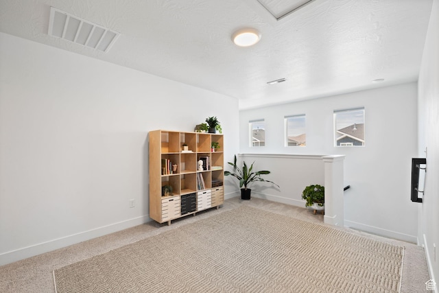4892 E Lake Corner Dr, Eagle Mountain, UT 84005 - sitting room featuring an upstairs landing and carpet floors