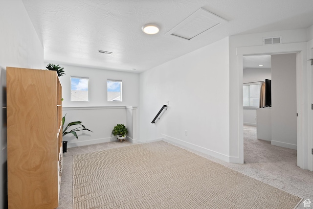 4892 E Lake Corner Dr, Eagle Mountain, UT 84005 - empty room with attic access and carpet