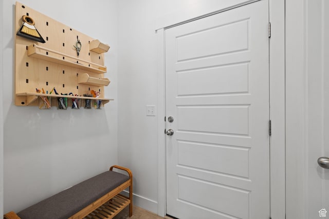 4892 E Lake Corner Dr, Eagle Mountain, UT 84005 - mudroom featuring baseboards and light wood-type flooring