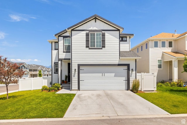 4892 E Lake Corner Dr, Eagle Mountain, UT 84005 - view of front of property featuring board and batten siding, driveway, an attached garage, and a gate
