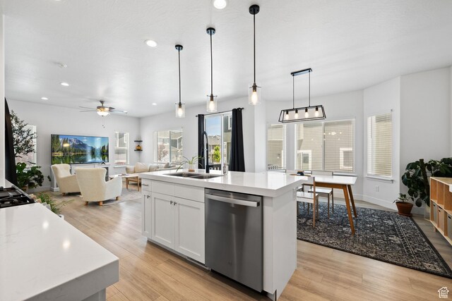 4892 E Lake Corner Dr, Eagle Mountain, UT 84005 - kitchen featuring dishwasher, light wood finished floors, recessed lighting, a ceiling fan, and decorative light fixtures