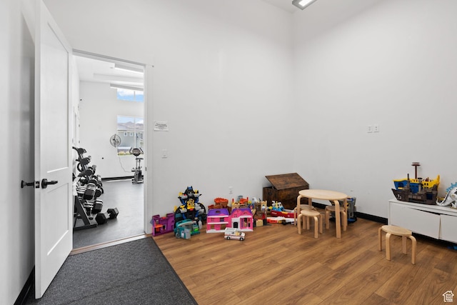 4892 E Lake Corner Dr, Eagle Mountain, UT 84005 - rec room with wood finished floors