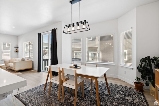 4892 E Lake Corner Dr, Eagle Mountain, UT 84005 - dining room with plenty of natural light, light wood-style flooring, recessed lighting, and a chandelier