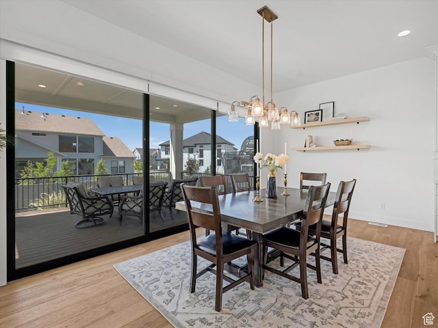 1172 E Candy Ln, American Fork, UT 84003 - dining space featuring wood finished floors and a chandelier