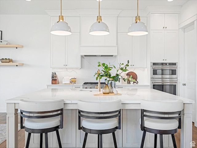 1172 E Candy Ln, American Fork, UT 84003 - kitchen featuring double oven, light stone countertops, hanging light fixtures, white cabinets, and recessed lighting