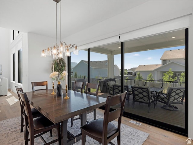 1172 E Candy Ln, American Fork, UT 84003 - dining area with light wood-type flooring and a residential view