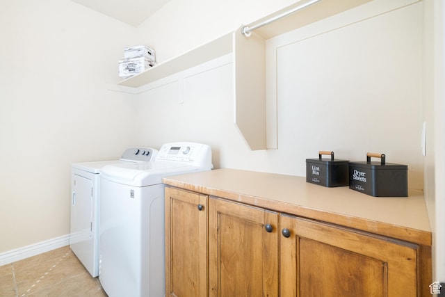 986 View Crest Ln, Kaysville, UT 84037 - laundry room with cabinet space, independent washer and dryer, and light tile patterned flooring