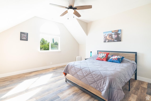 986 View Crest Ln, Kaysville, UT 84037 - bedroom with wood finished floors, vaulted ceiling, and a ceiling fan