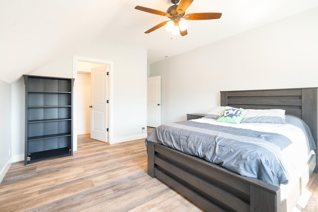 986 View Crest Ln, Kaysville, UT 84037 - bedroom featuring wood finished floors, a ceiling fan, vaulted ceiling, and a spacious closet