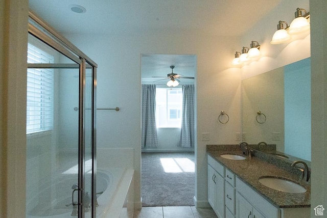 63 N Canyon Maple Rd, Vineyard, UT 84059 - bathroom with double vanity, a bath, a stall shower, and healthy amount of natural light