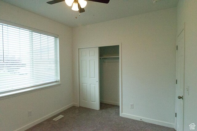 63 N Canyon Maple Rd, Vineyard, UT 84059 - unfurnished bedroom with carpet floors, a closet, and a ceiling fan