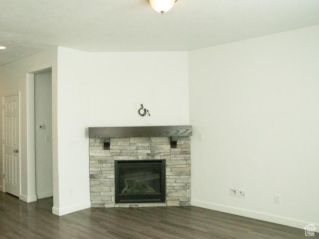 63 N Canyon Maple Rd, Vineyard, UT 84059 - unfurnished living room with wood finished floors and a fireplace