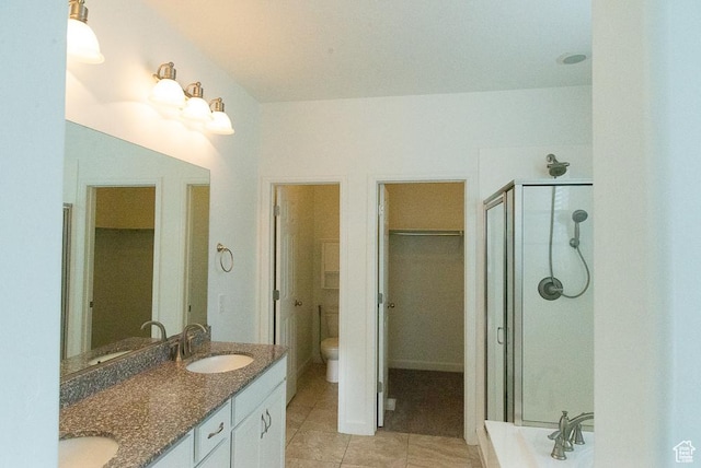 63 N Canyon Maple Rd, Vineyard, UT 84059 - bathroom with tile patterned flooring, a stall shower, double vanity, and a spacious closet