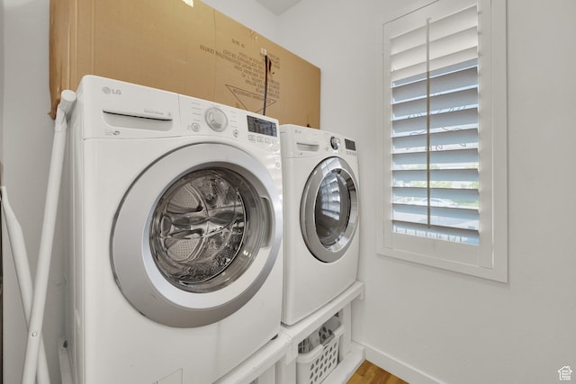 1752 S 570 W, Provo, UT 84601 - laundry area featuring washer and clothes dryer and wood finished floors