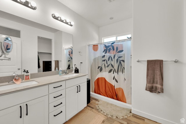 1752 S 570 W, Provo, UT 84601 - bathroom featuring wood finished floors, double vanity, and curtained shower