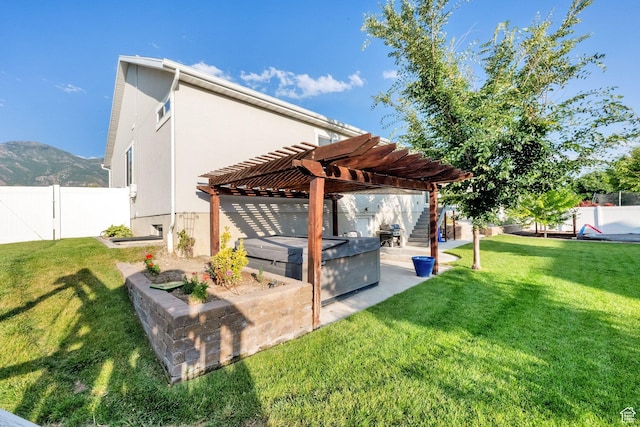 1752 S 570 W, Provo, UT 84601 - back of property with a fenced backyard, a patio area, a pergola, stucco siding, and a mountain view