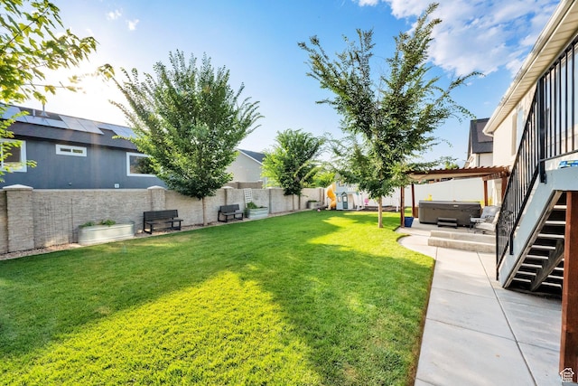 1752 S 570 W, Provo, UT 84601 - fenced backyard with a hot tub, stairs, and a patio area