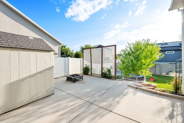 1752 S 570 W, Provo, UT 84601 - view of patio / terrace with a fire pit and a storage shed