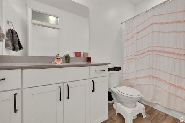 1752 S 570 W, Provo, UT 84601 - full bath featuring wood finished floors, vanity, and curtained shower