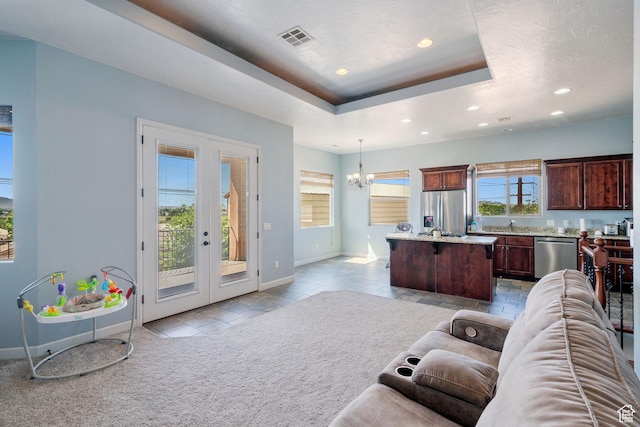 2752 E 50 S, St George, UT 84790 - living area featuring a chandelier, recessed lighting, french doors, and a raised ceiling