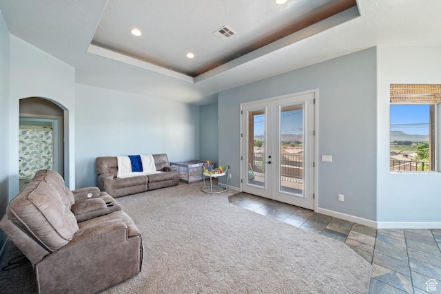 2752 E 50 S, St George, UT 84790 - living room with a tray ceiling, french doors, arched walkways, and recessed lighting