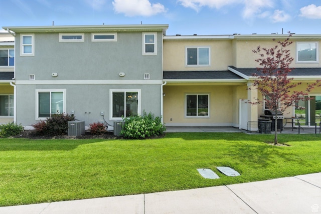 5423 W Black Hills Ln, Herriman, UT 84096 - back of property featuring a patio, stucco siding, and a yard