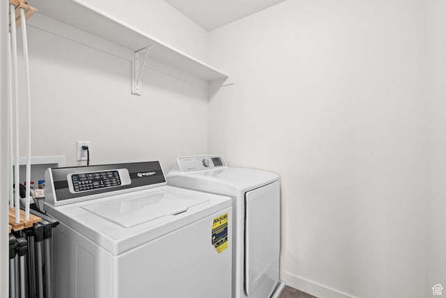 5423 W Black Hills Ln, Herriman, UT 84096 - laundry area featuring washer and clothes dryer