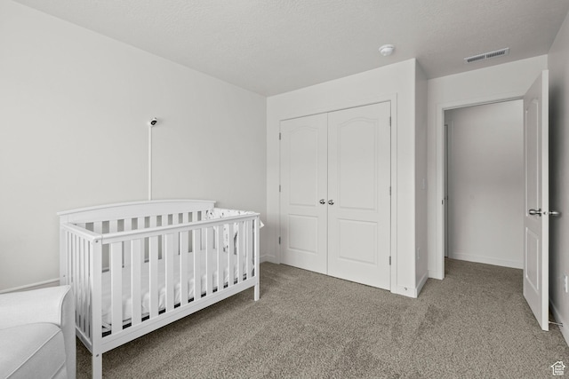 5423 W Black Hills Ln, Herriman, UT 84096 - bedroom with carpet, a closet, and a nursery area