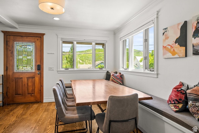 915 Norfolk Ave, Park City, UT 84060 - dining area with crown molding and light wood-style floors