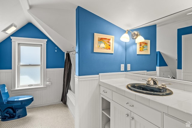 915 Norfolk Ave, Park City, UT 84060 - full bath featuring a wainscoted wall, lofted ceiling, vanity, and shower / tub combo