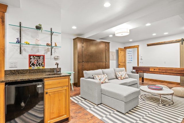 915 Norfolk Ave, Park City, UT 84060 - living room with wet bar, light wood-style flooring, recessed lighting, and a barn door