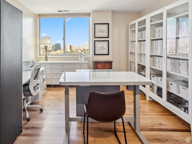 777 E S Temple Unit 13B, Salt Lake City, UT 84102 - office space featuring light wood-style floors and a city view