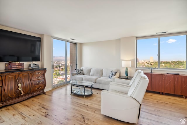 777 E S Temple Unit 13B, Salt Lake City, UT 84102 - living area with light wood-type flooring