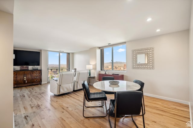 777 E S Temple Unit 13B, Salt Lake City, UT 84102 - dining space with wood finished floors and recessed lighting