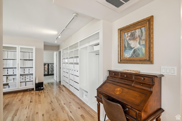 777 E S Temple Unit 13B, Salt Lake City, UT 84102 - interior space with light wood-type flooring and track lighting
